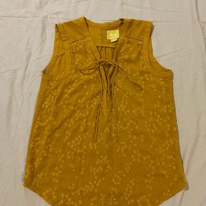 Mustard colored Maeve sleeveless blouse.